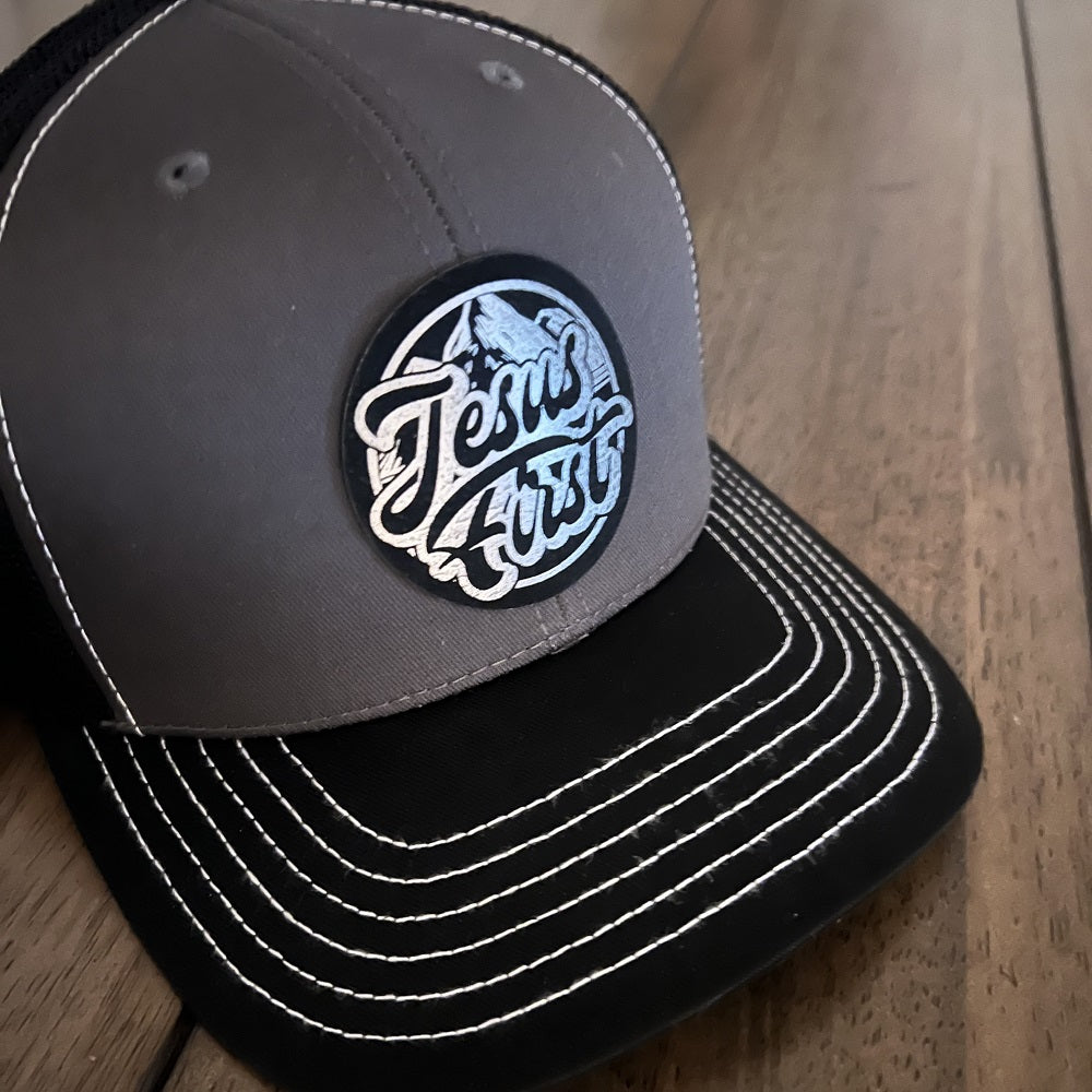 Jesus First - Mesh Back Trucker Hat Leather Patch - Black/Grey